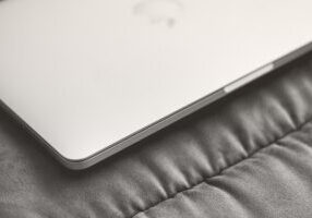 Macbook on sofa